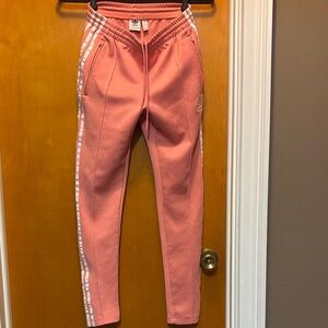Adidas Women's Pink Joggers with White Stripes